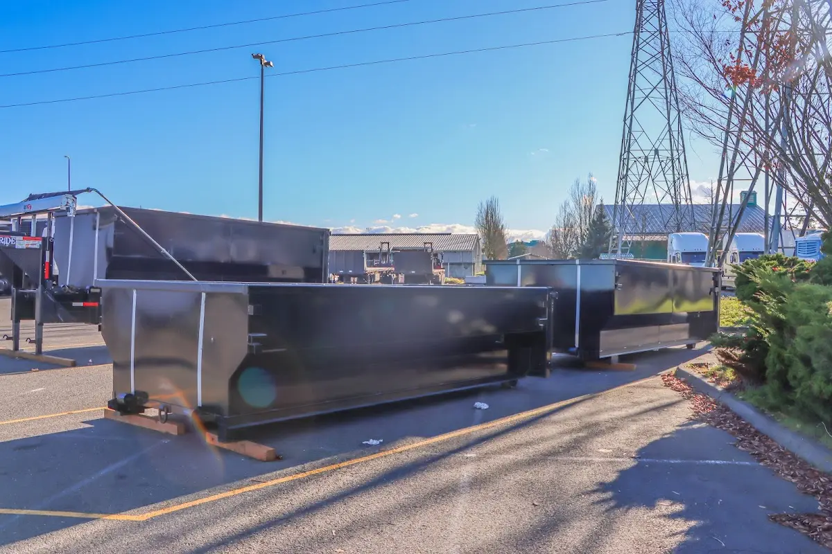 Roll-off dumpster ready for waste disposal at job site for Construction Dumpster Rental in Alton